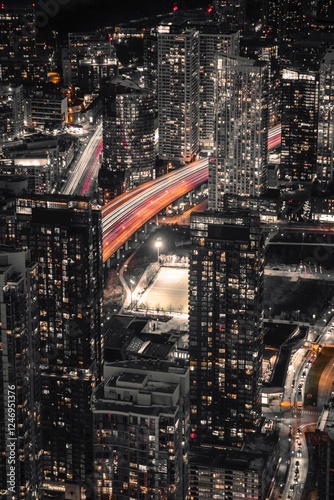 Canvas Print Aerial Night View of Toronto Skyline with Light Trails and Skyscrapers