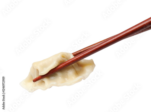 Chopsticks with fresh gyoza dumpling isolated on white