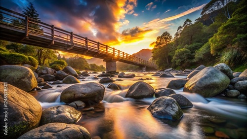 Silhouette of Wooden Bridge over Boulders, Wairere, Kaimai Mountains, New Zealand photo