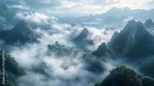 Wallpaper Mural Valley of mists wrapped in thick clouds and gracefully sculpted hills Torontodigital.ca