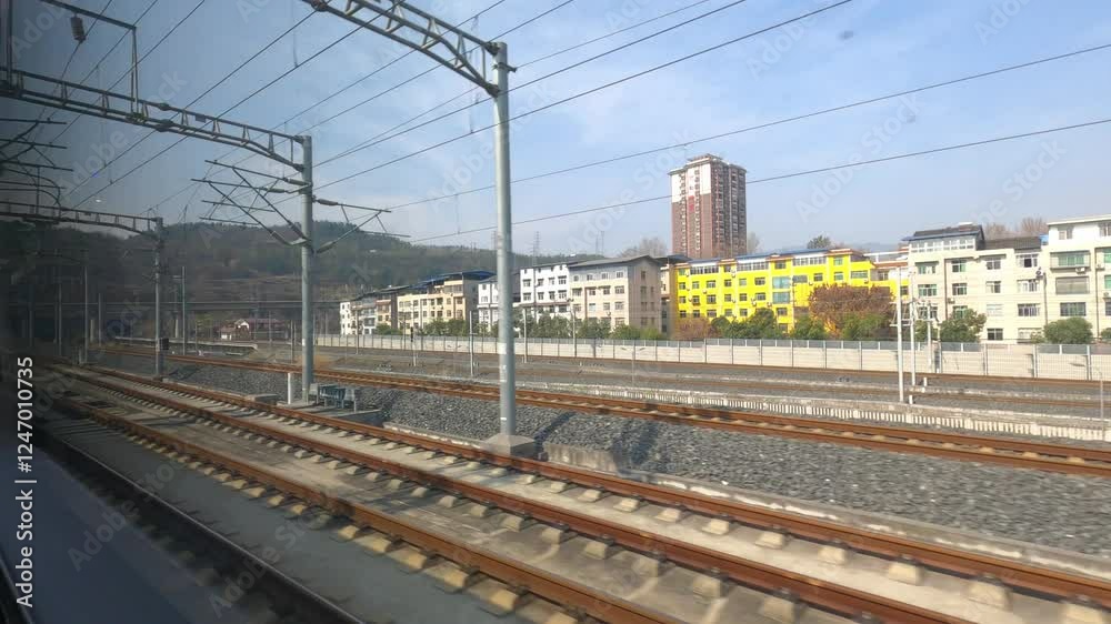 Live green train journey showcasing urban landscapes and railway tracks in a serene environment Live green train journey showcasing urban landscapes and railway tracks in a serene environment