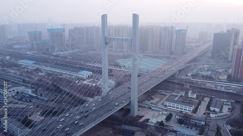 Exploring Zhengzhou Agricultural Road Bridge and Railway Bridge amidst urban development
