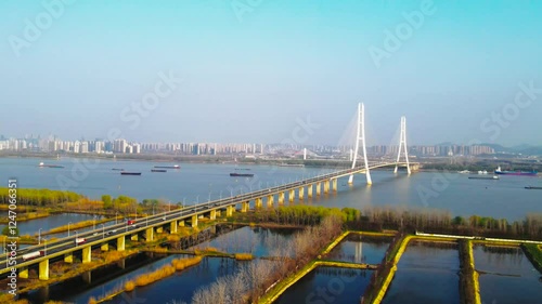 Aerial view showcasing Nanjing Dasheng Pass Bridge and surrounding landscape in Nanjing, China photo