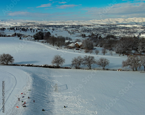 drone aerial photo of the Lewis Clark Valley at sunrise with a fresh banket of snow