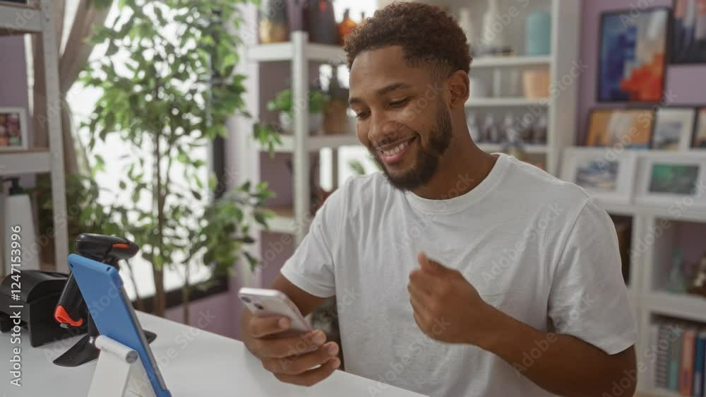 Young man shopping online using smartphone in a home decor store Young man shopping online using smartphone in a home decor store