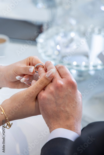 bride and groom holding hands