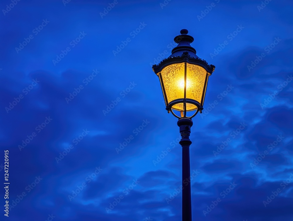 Lamp with bright illumination in evening sky Lamp with bright illumination in evening sky