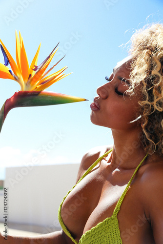 Beautiful curly woman having a home beauty session 