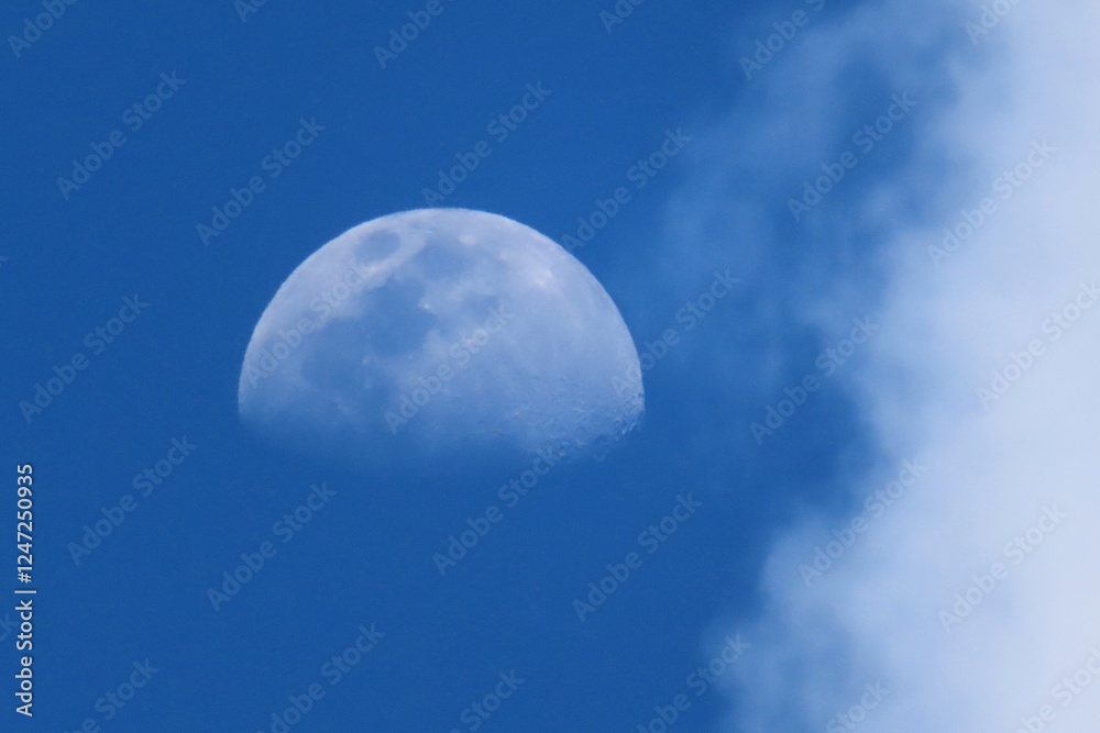 Full moon on blue sky and clouds background Full moon on blue sky and clouds background