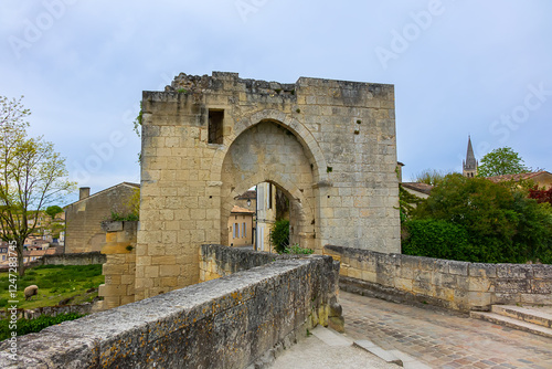 Brunet Gate and the ramparts. Saint Emilion's ramparts were commissioned by England in the 12th century to protect prosperous Saint-Emilion's village. Aquitaine Region, Gironde Department, France. photo