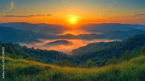 Majestic Sunrise Over Misty Mountain Range photo