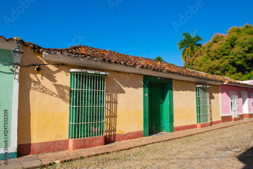 Photography Historic residential buildings on Calle Real del Jigue near Plaza Mayor in historic city centre of Trinidad, Cuba