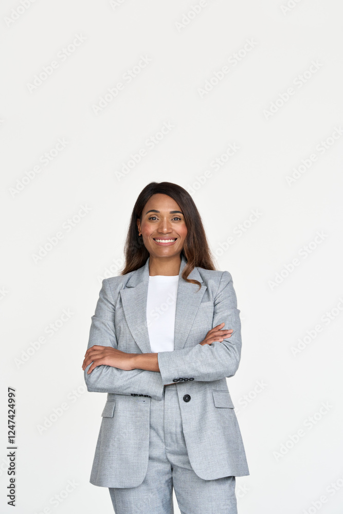 Happy African American business woman corporate leader, smiling female leader executive business owner wearing grey suit standing arms crossed isolated on white background. Vertical portrait. Happy African American business woman corporate leader, smiling female leader executive business owner wearing grey suit standing arms crossed isolated on white background. Vertical portrait.