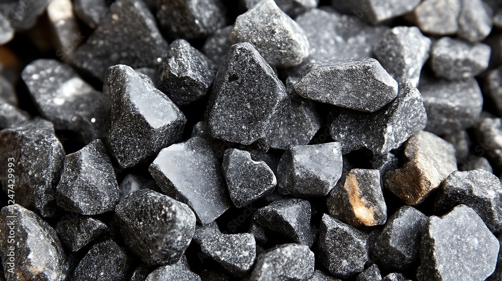 A Collection Of Dark Grey Irregularly Shaped Stones A Collection Of Dark Grey Irregularly Shaped Stones