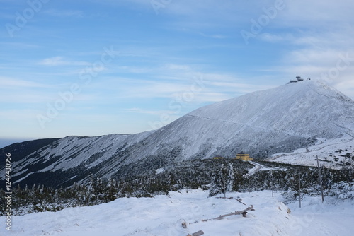 Fototapeta Naklejka Na Ścianę i Meble -  Śnieżka Mountain climbing in Poland. Photography of nature, mountain architecture, snow and mountains.