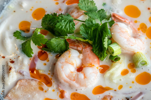 Thai coconut Tom Kha soup with shrimp. Detail. photo