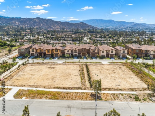 During a hot summer in the USA, an aerial view captures the homes of Corona, a town situated in inland Southern California. photo