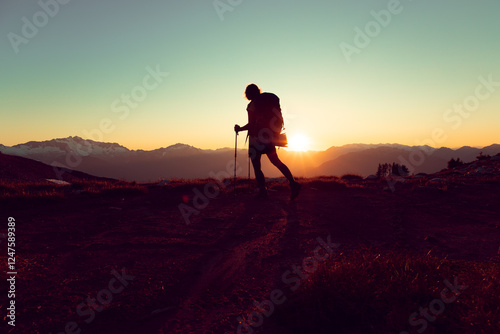 Woman hiker at sunset