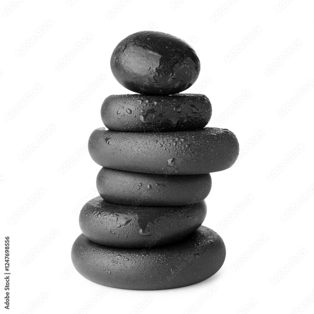 Stack of wet spa stones isolated on white