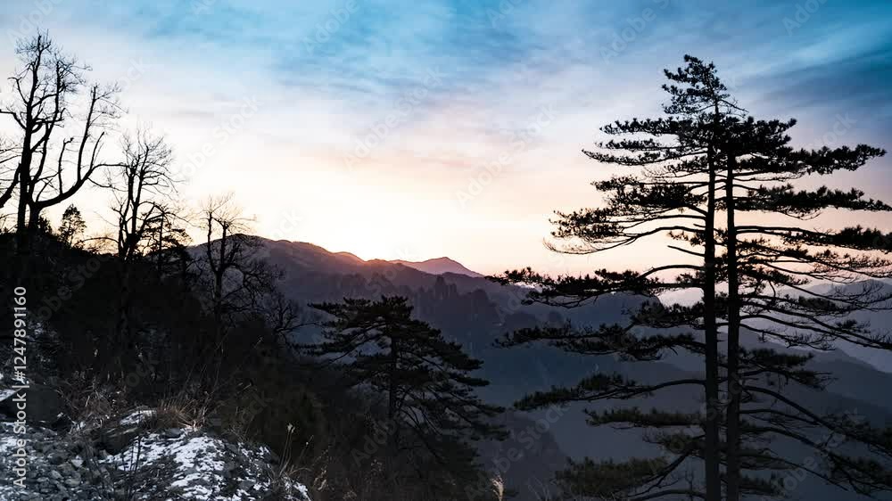 Timelapse of an atmospheric alpine sunrise over majestic mountain peaks and serene trees Timelapse of an atmospheric alpine sunrise over majestic mountain peaks and serene trees