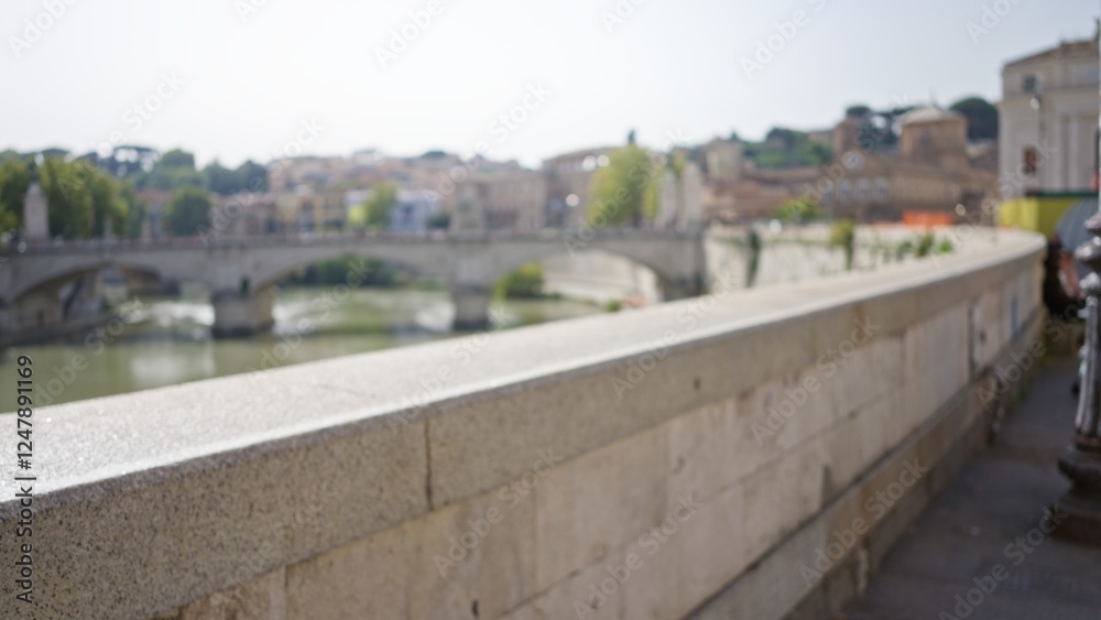 Fototapeta premium Blurred view of an old street in rome with defocused buildings and bokeh lights, capturing the essence of historic italian urban life outdoors.