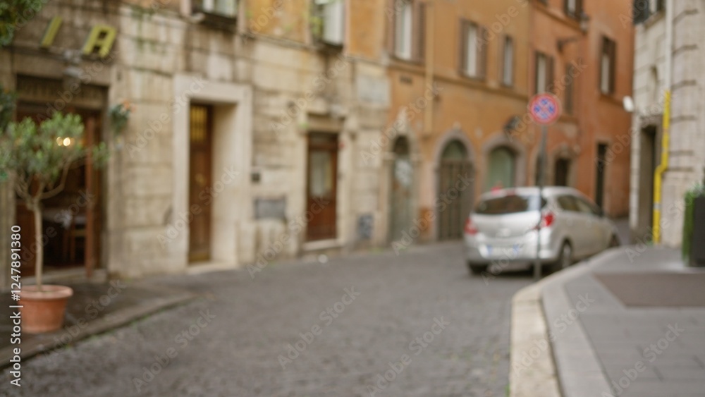 Blurry street scene in rome with defocused background and bokeh effect showing cobblestone road, old buildings, and a car outdoors in italy. Blurry street scene in rome with defocused background and bokeh effect showing cobblestone road, old buildings, and a car outdoors in italy.