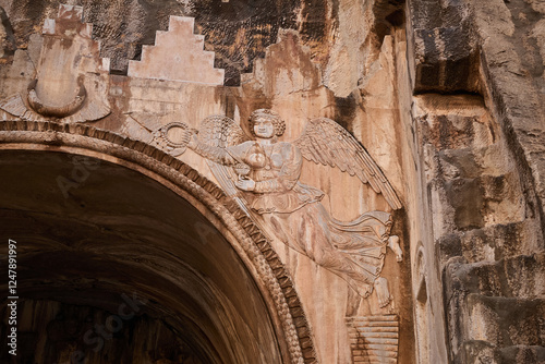 Angel relief in Taq-e Bostan in Kermanshah city, Iran photo