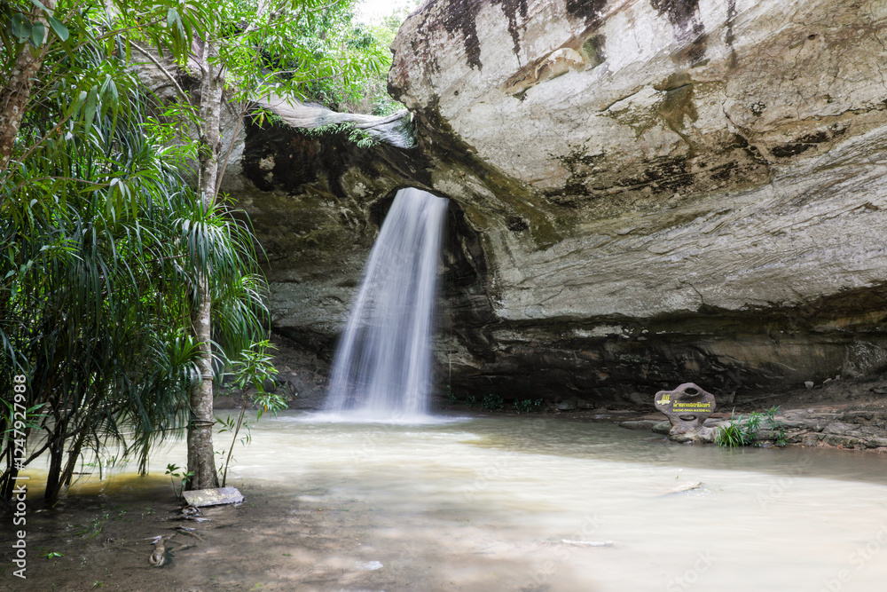 Naklejka premium Saeng Chan Waterfall (Long Ru Waterfall), Pha Taem National Park, “Unseen Thailand”, named after the waterfall that sprays mist through the rocks, giving it a soft white color similar to moonlight.