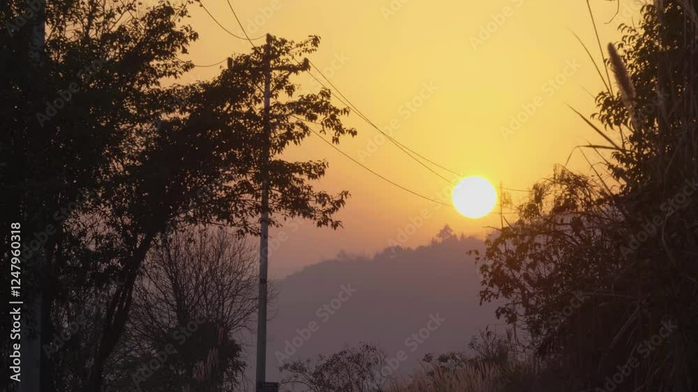 Sunset colors over western mountains during calm evening sky