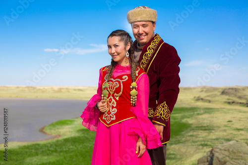 Kazakh woman and man in national costumes