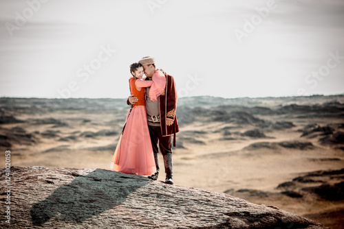 Kazakh woman and man in national costumes