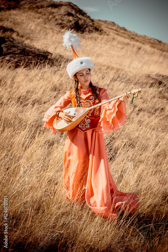 Kazakh woman and man in national costumes