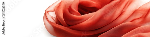 A close-up shot of a bright red scarf against a white background