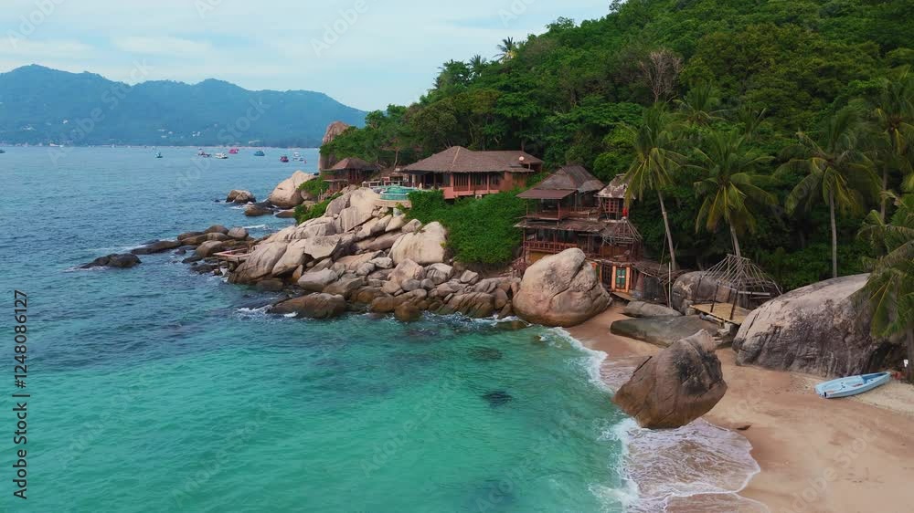 Koh Tao, Thailand. Hidden white sand beach resort bay, tropical jungle, clear water. Aerial view. Koh Tao, Thailand. Hidden white sand beach resort bay, tropical jungle, clear water. Aerial view.