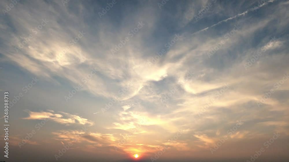Stunning atmospheric sky clouds during sunset timelapse captures vibrant hues and shifting formations Stunning atmospheric sky clouds during sunset timelapse captures vibrant hues and shifting formations