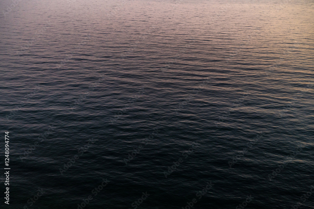 Water sea sunset. Sun reflection ocean waves. Nature golden abstract texture surface.