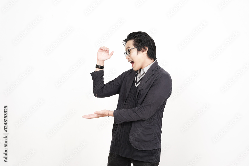 Holding and Presenting copyspace on open palm, Measuring something Of Handsome Asian Man Isolated On White Background