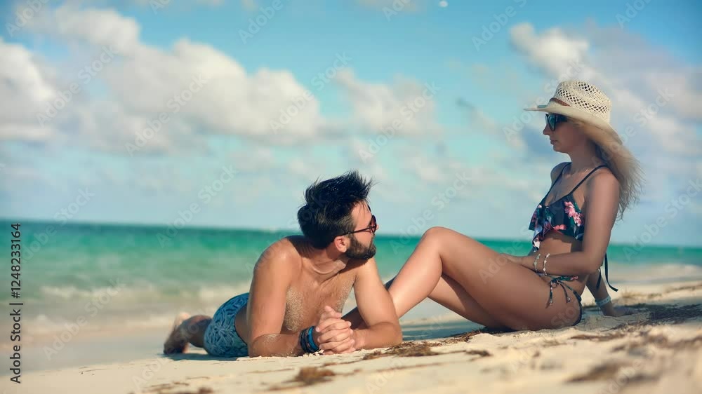 Guy resting on Caribbean tropical beach Guy resting on Caribbean tropical beach