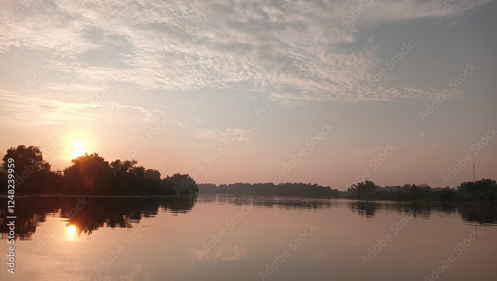 Obraz premium Morning view of river and full of green vegetation in Bojonegoro Indonesia