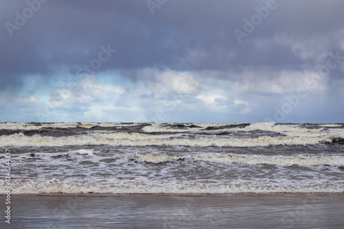 
you can see the foam formed by the waves of the sea.