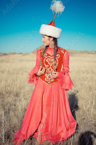 Kazakh woman and man in national costumes