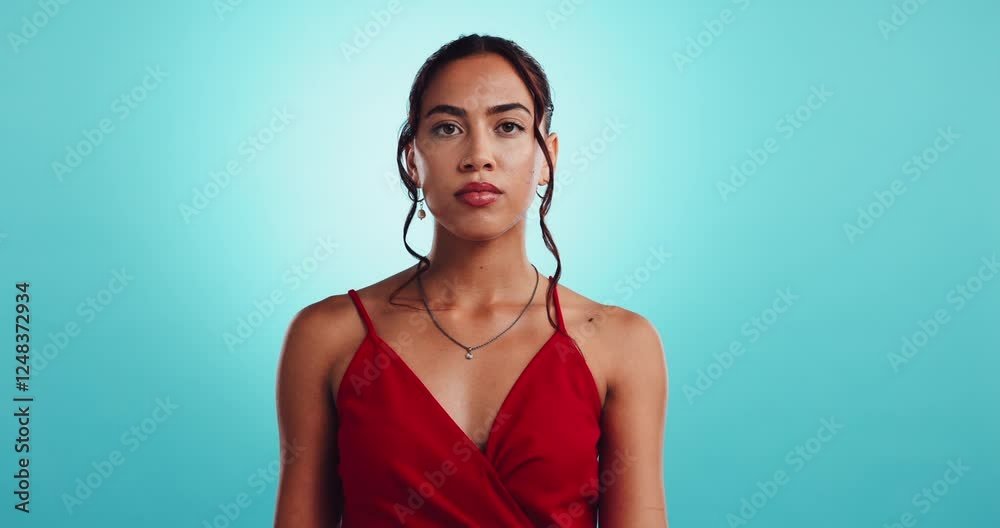 Paper, heartbreak and face of woman in studio with anger, disappointment and sad on valentines day. Frustrated, breakup and portrait of girl with love emoji, broken heart shape and blue background