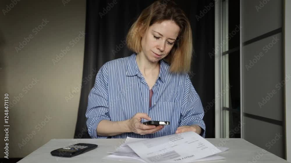 Woman pays utility bills online on smartphone, banking transaction and finance management, digital payment for electricity and water expenses