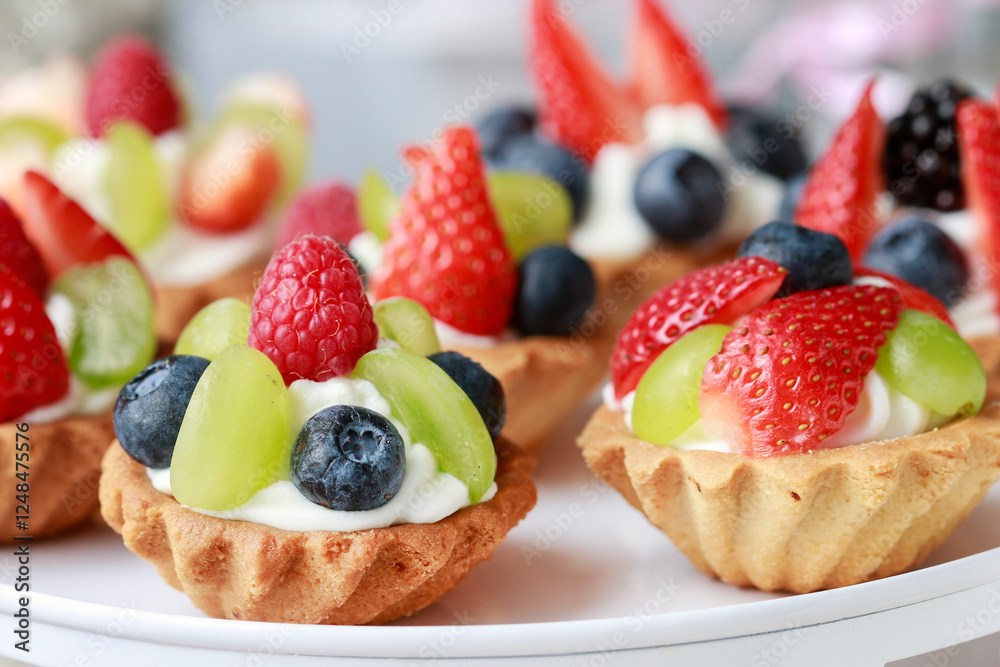 Cupcakes with fresh fruits for the party.