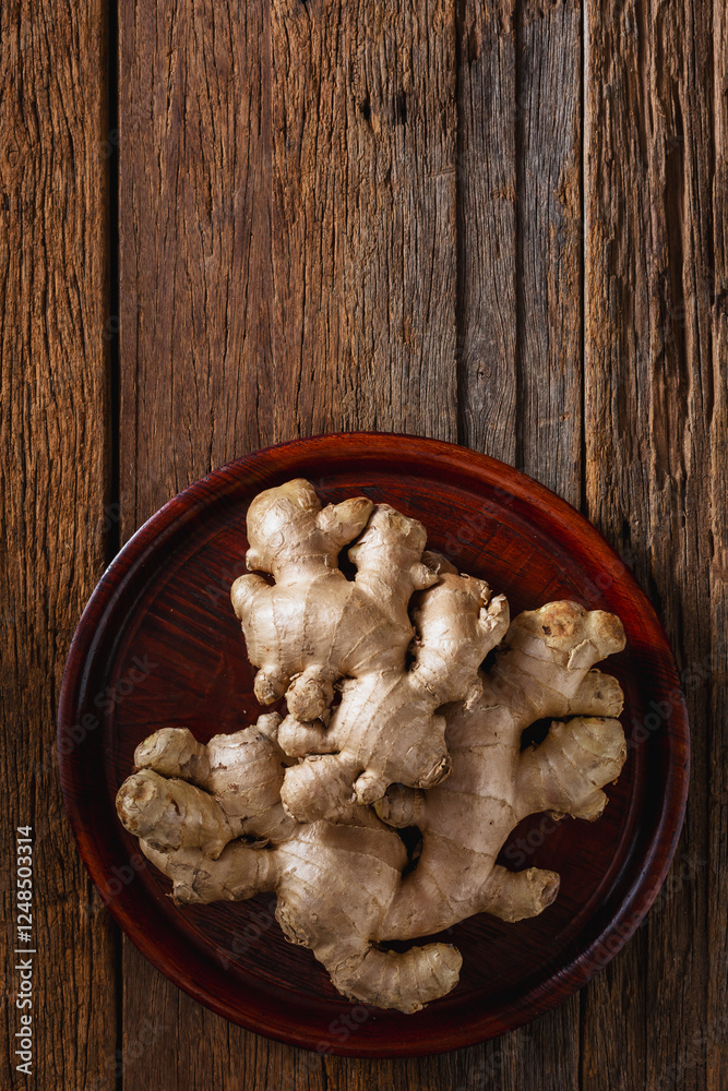 Fototapeta premium ginger on wooden background