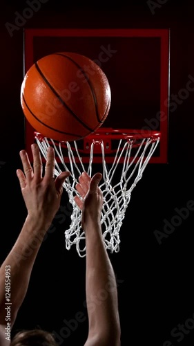 Wallpaper Mural Super Slow Motion of Basketball Ball Hitting the Basket. Filmed on High Speed Cinema Camera, 1000fps. Camera in Motion. Vertical Aspect Ratio. Torontodigital.ca