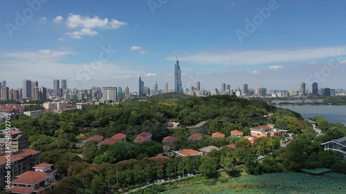 Explore aerial views of garden lakes in Xuanwu Lake Scenic Area, Nanjing City under clear skies