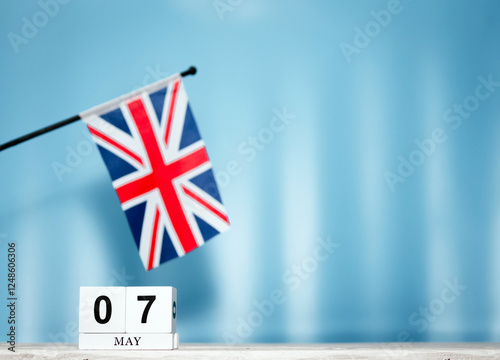 May Calendar With British Flag With Number  7. Calendar cubes with numbers. Space copy. photo