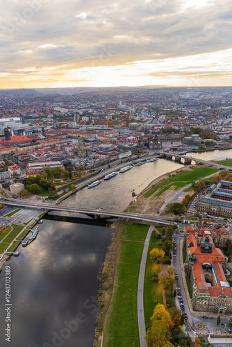 Stunning view of Dresden at sunset from hot air balloon. Charming cityscape with historic houses and winding Elbe River photo