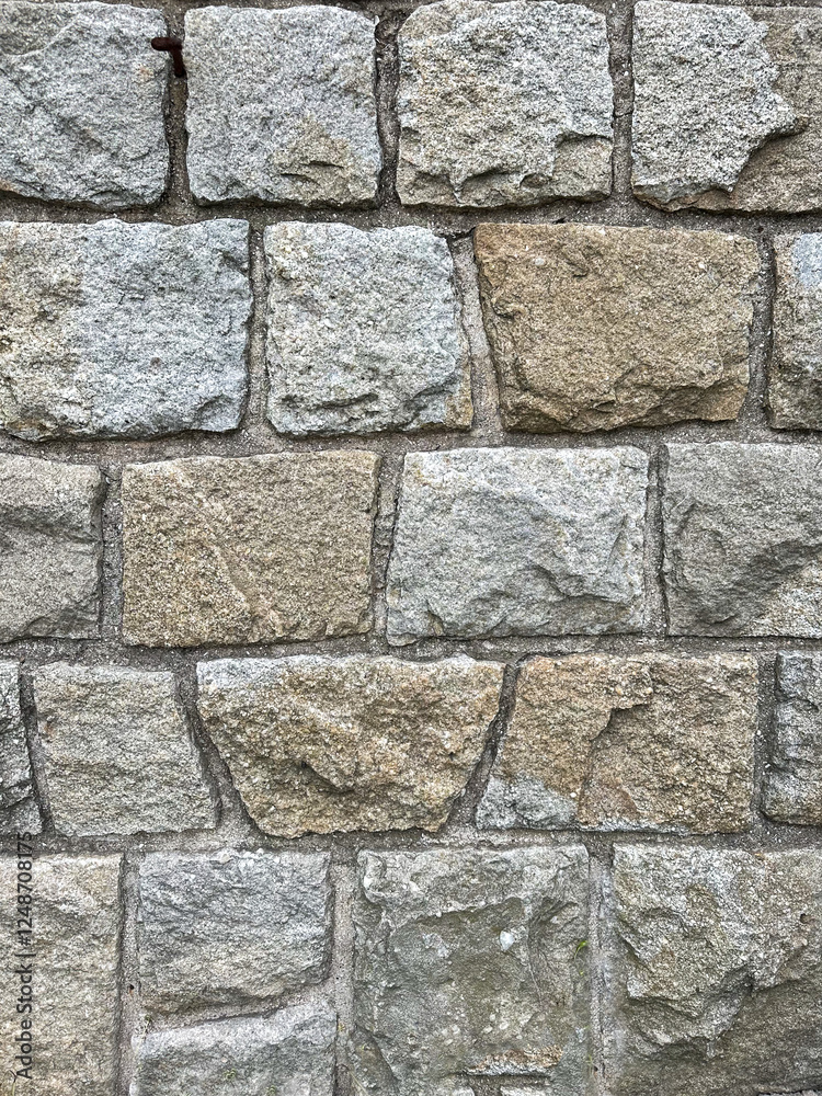uneven stone wall texture background in brown and grey color uneven stone wall texture background in brown and grey color
